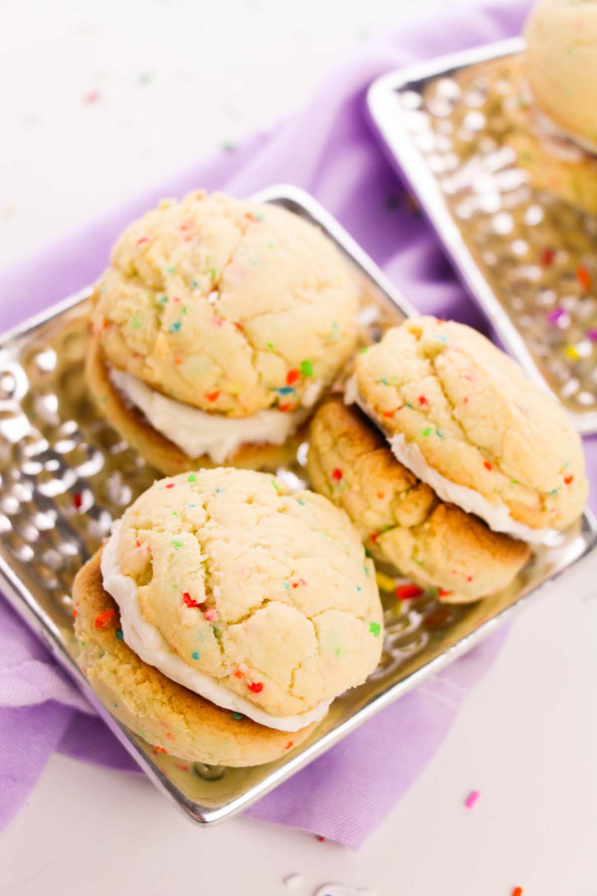 top view of cookie sandwiches on a plate.